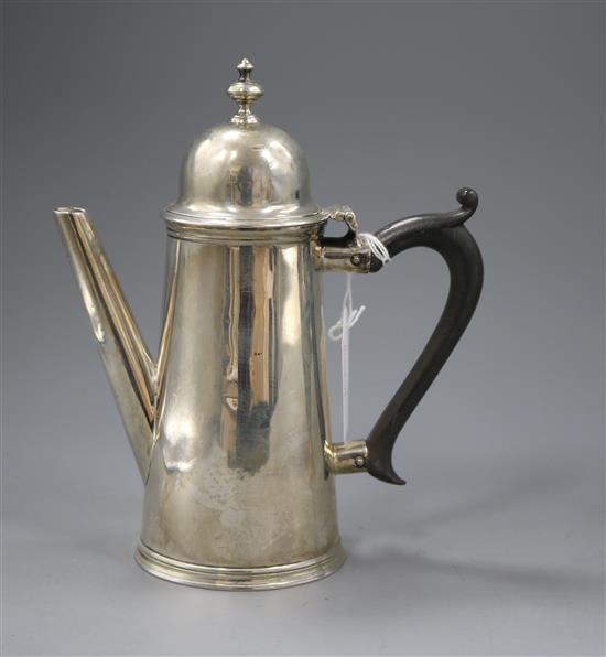 A modern silver George I style coffee pot, London, 1956, gross 9.5 oz.